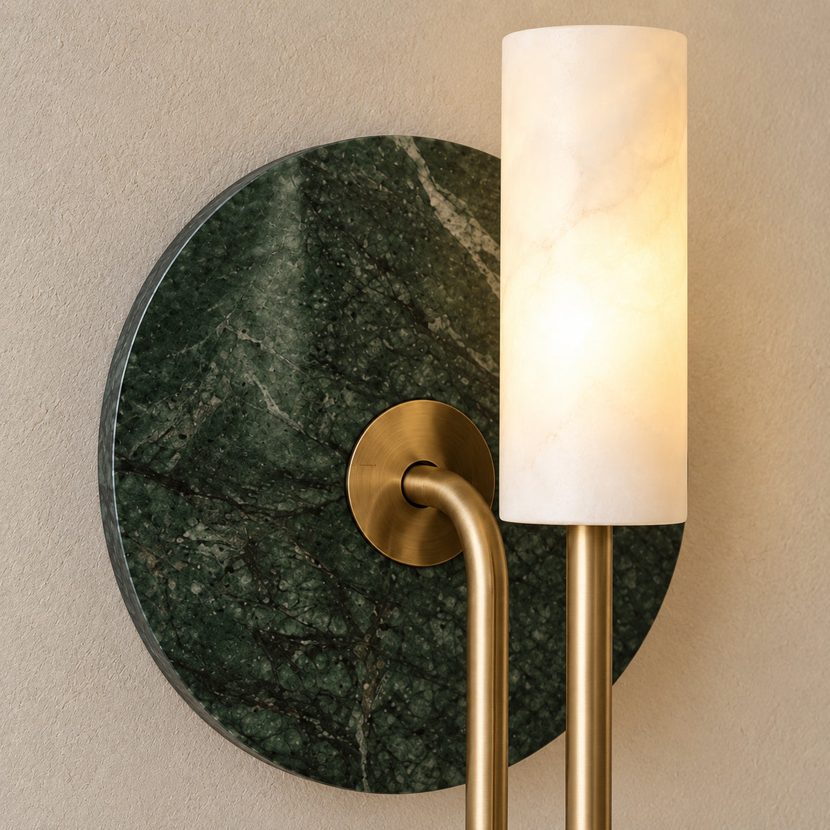 Vesta green marble wall light, generated material detail showing green stone backplate, white translucent cylinder and brass-tone U-arm