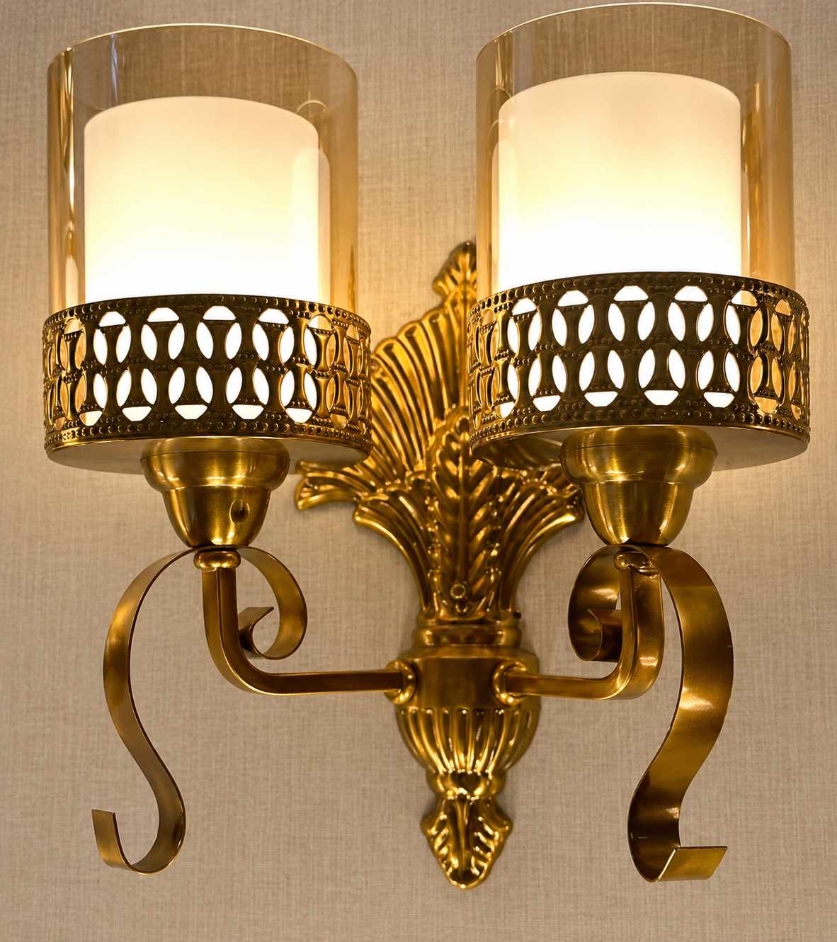 Vintage twin sconce pierced sleeves and leaf ornament — source-faithful edited detail