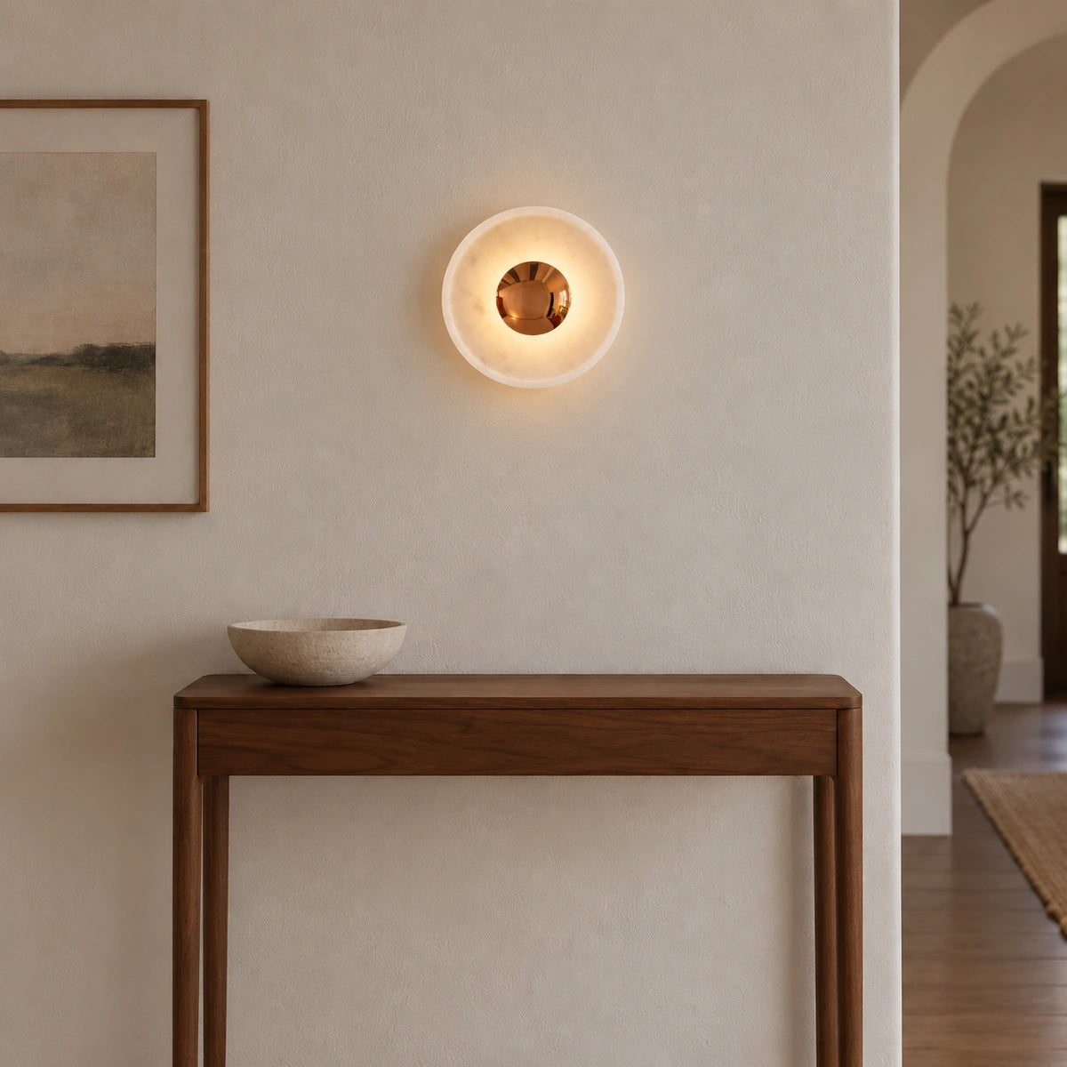 Generated White / Rose Gold Orbis Curv wall light in a distinct illuminated room scene